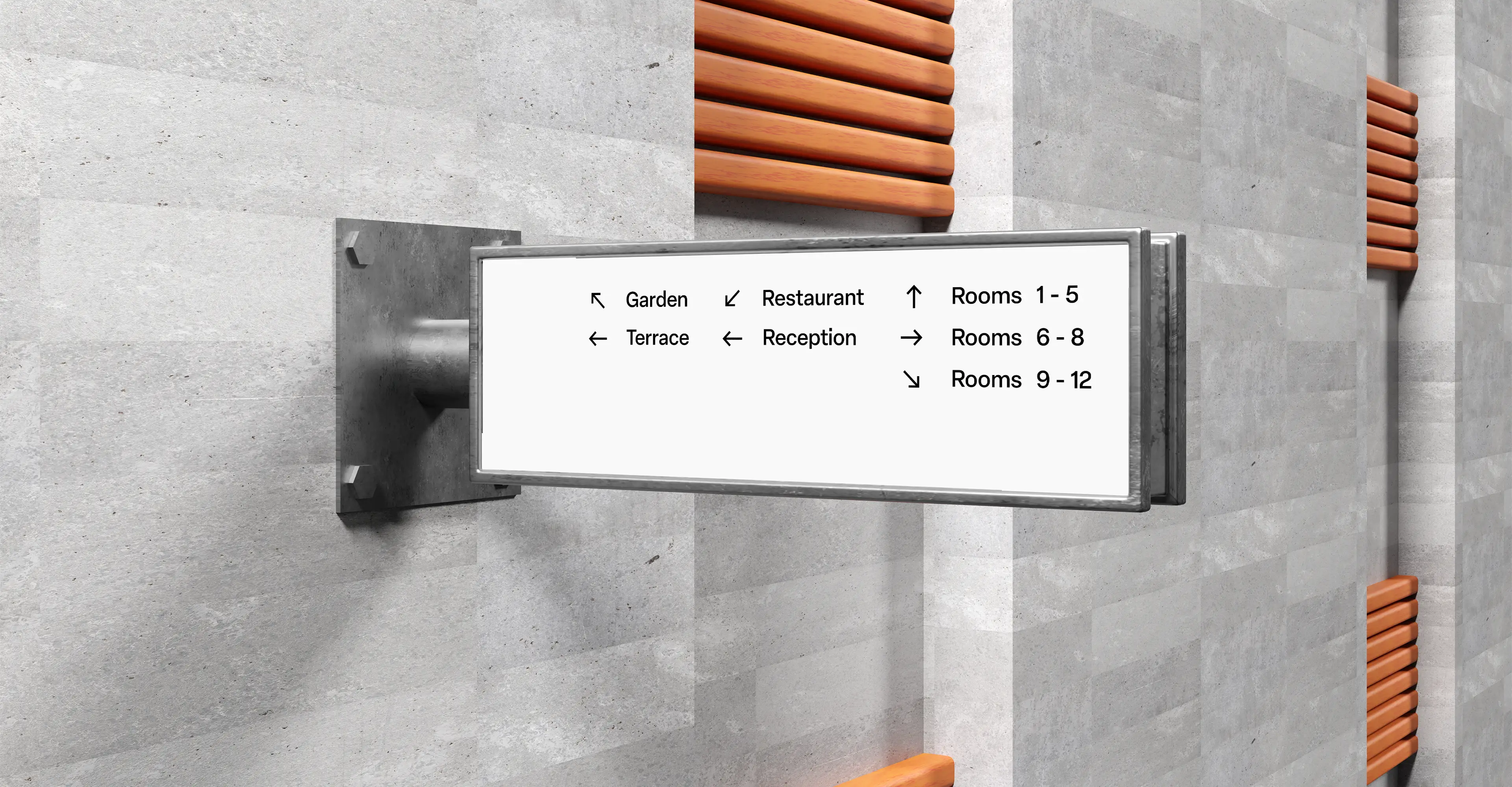 Indoor wayfinding signage with black arrows on a concrete wall with wood panels