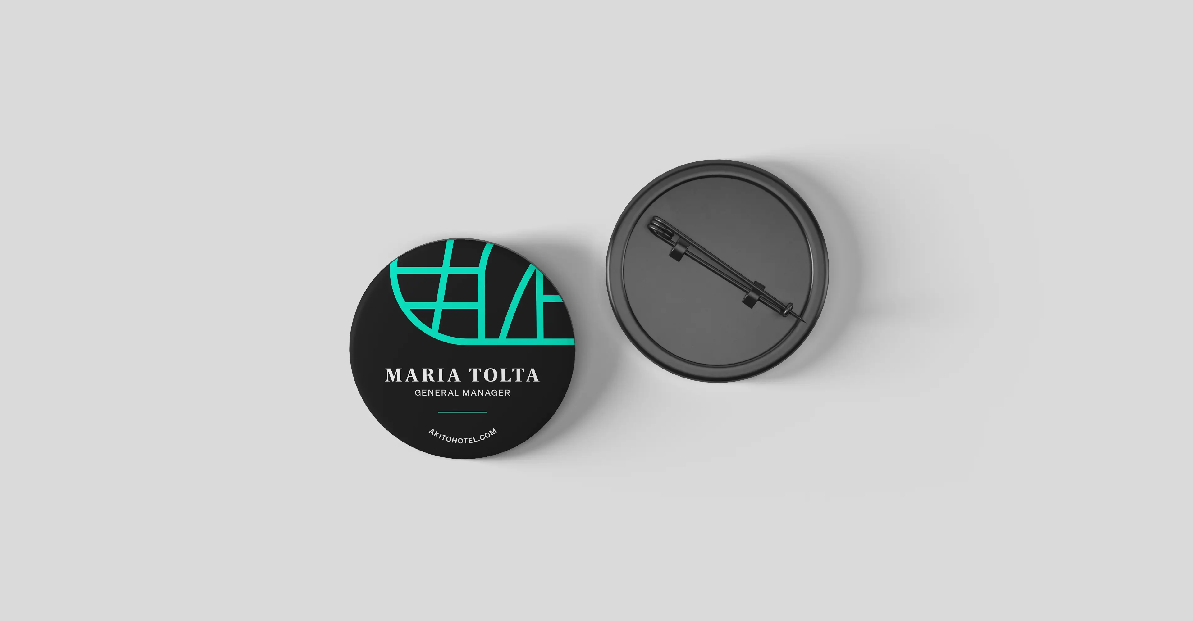 Round employee pin badge, background black and a green logo