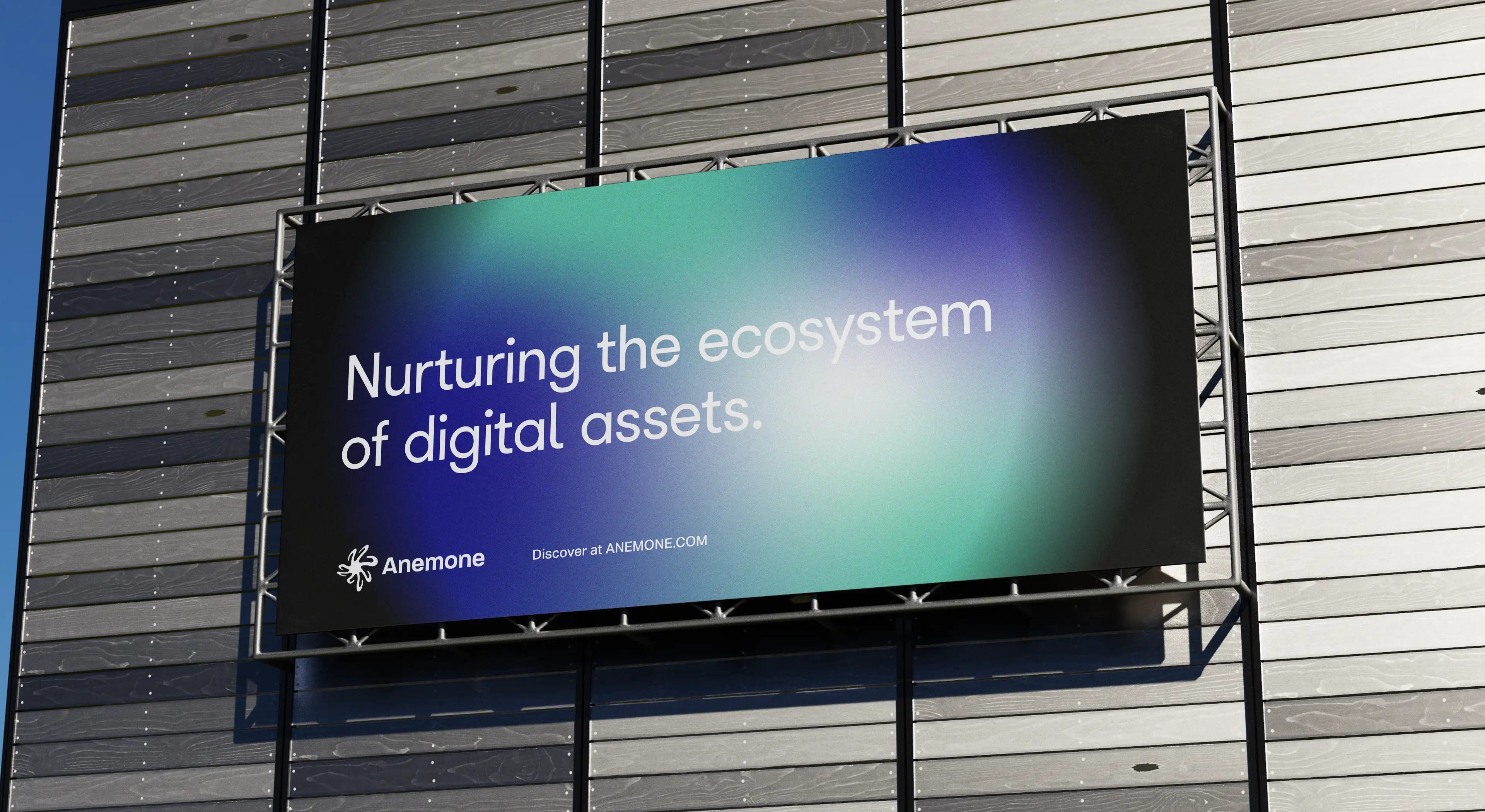 Billboard signage on a wooden wall with a blue gradient circle on a black background. Tagline talking about 'Digital Assets' for a Crypto company.