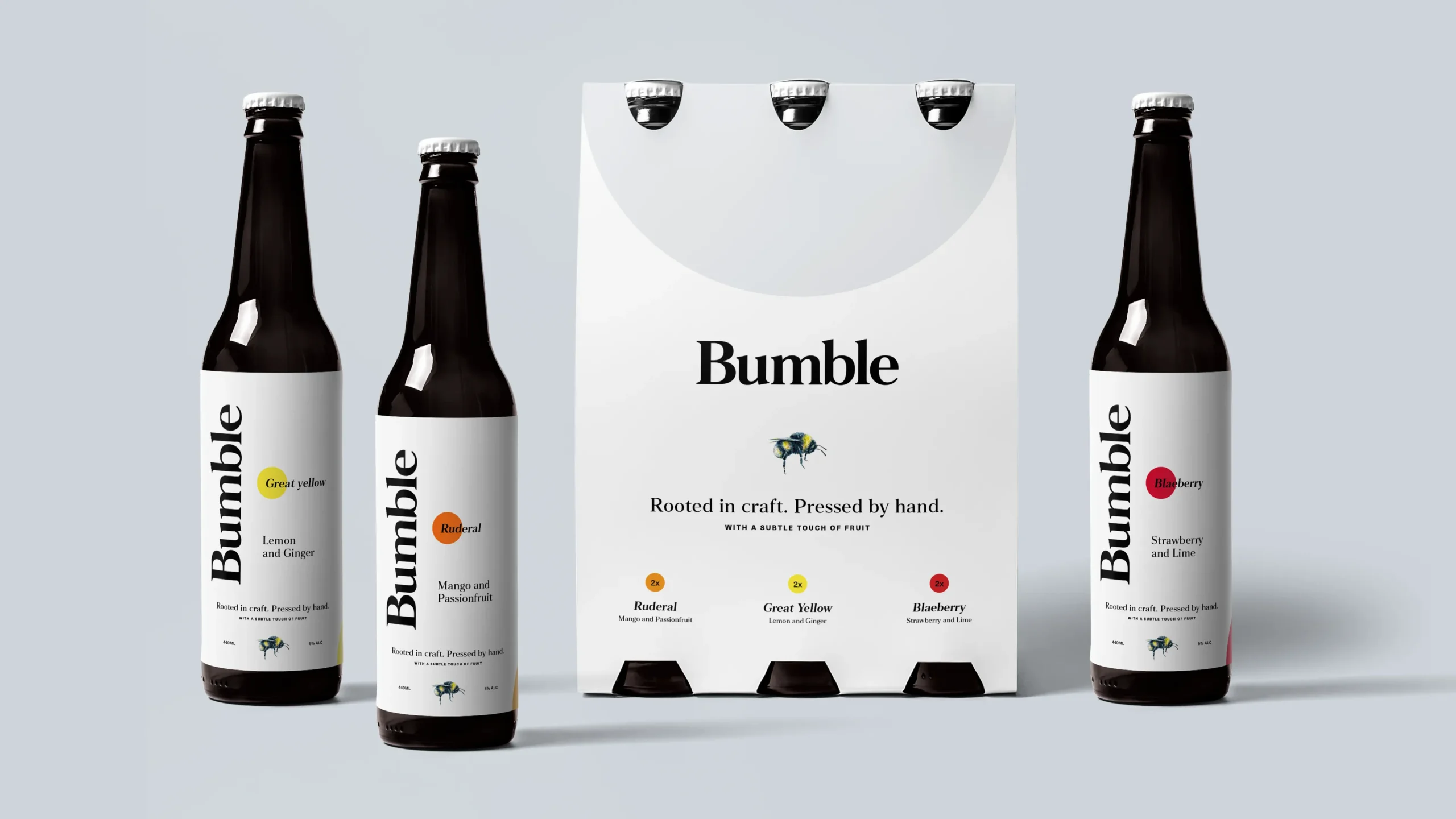 6-pack cider bottle packaging with three bottles arranged around it, showing different fruit flavours.