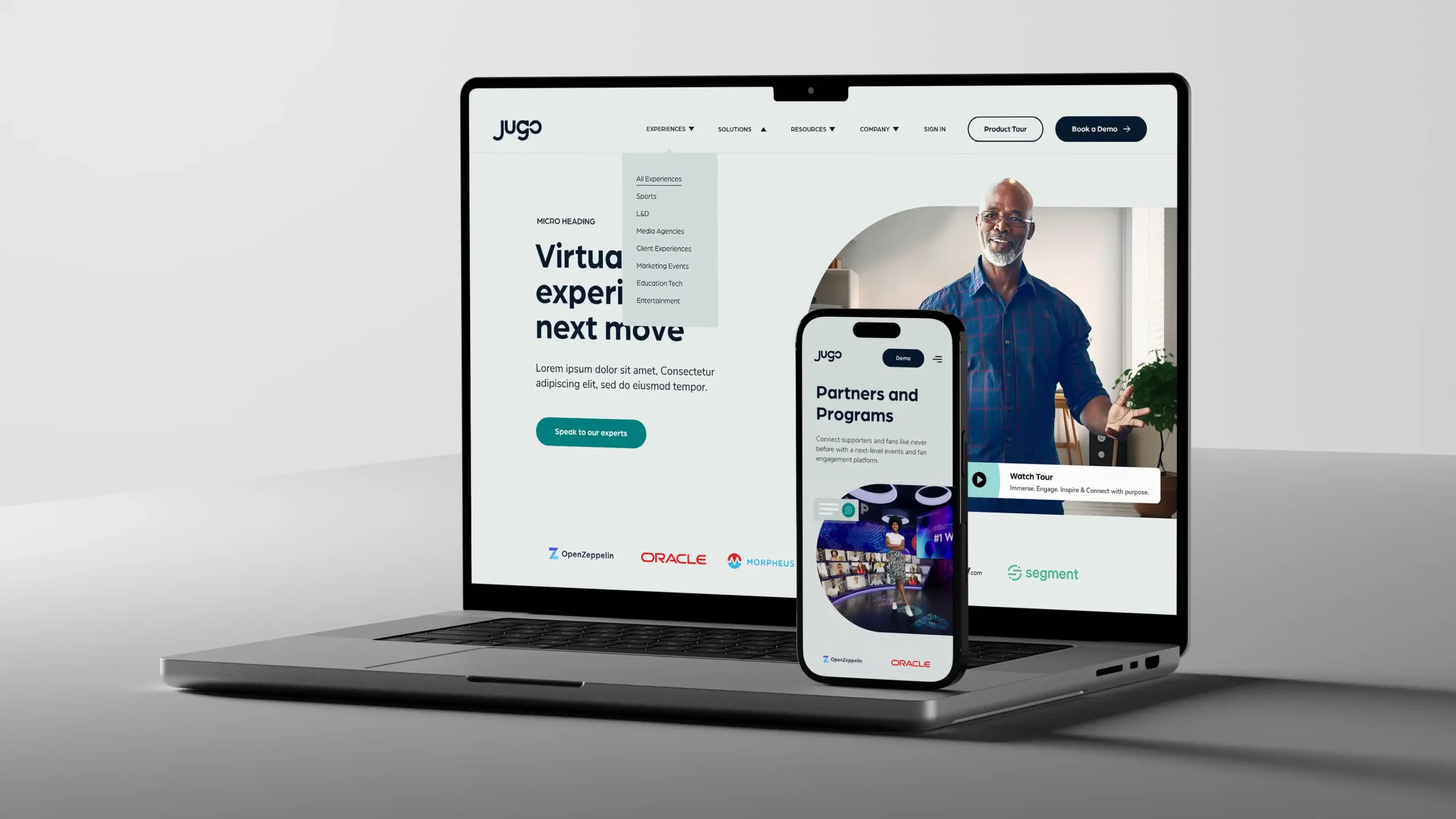 Jugo.io virtual experiences website on a laptop and mobile phone, highlighting "Partners and Programs" section.