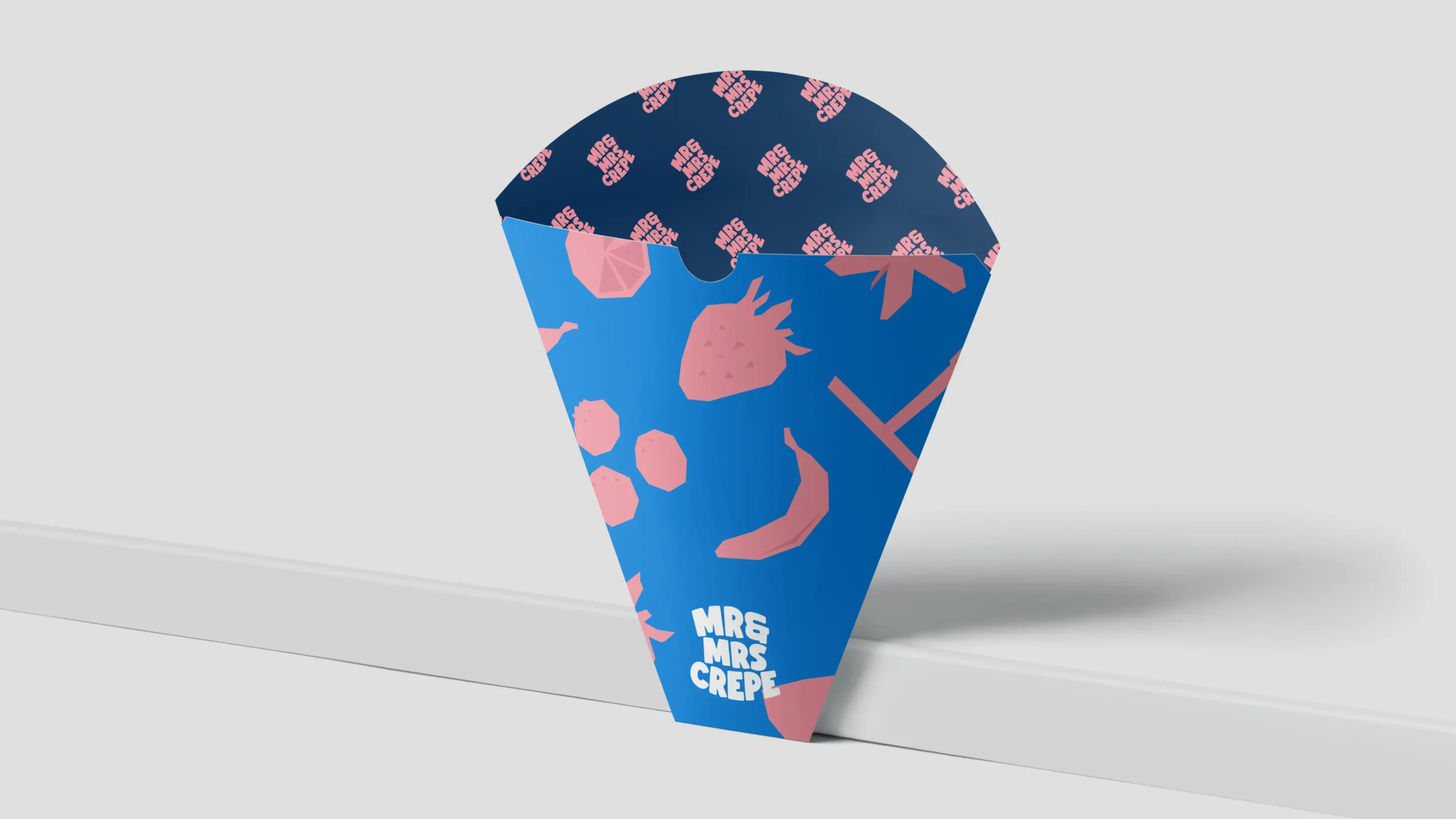 MrandMrsCrepe_Showcase_012 Blue Mr & Mrs Crepe branded cone-shaped packaging with pink ingredient illustrations.