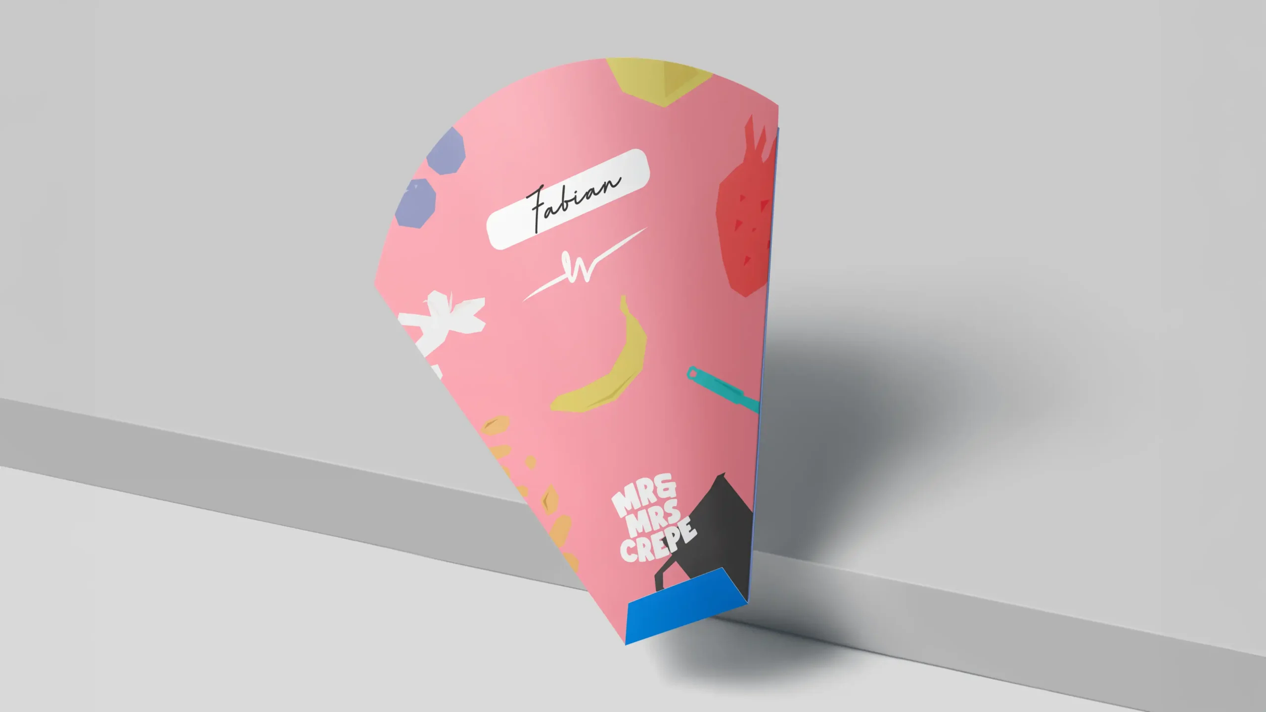 MrandMrsCrepe_Showcase_013 Pink Mr & Mrs Crepe branded cone-shaped packaging with colorful illustrations and a "Fabian" signature.